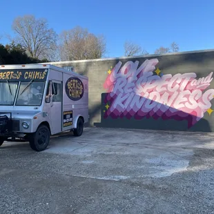 a truck parked in front of a building