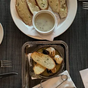 a plate of bread and a bowl of soup