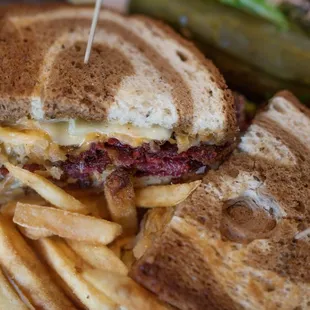 a grilled cheese sandwich and french fries