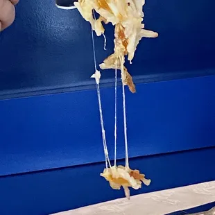 Bert's Diner: Hash brown cheese pull