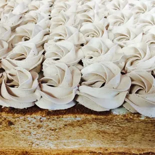 a close up of a cake with frosting