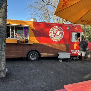 a food truck parked in a parking lot