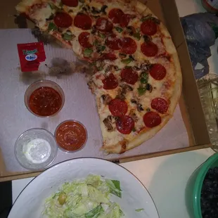 Delivery pizza and fresh salad. Yum.