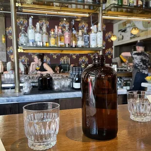 a bottle of liquor on a bar counter
