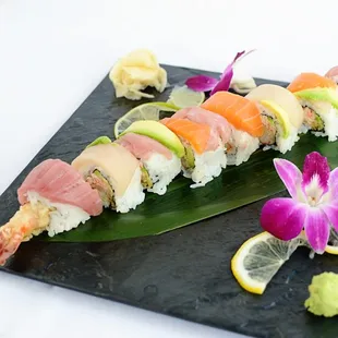 Black Tiger Rainbow Roll - Black tiger shrimp tempura, snow crab and avocado wrapped with tuna, salmon and yellowtail