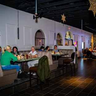 a group of people sitting at a table
