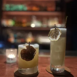 a glass of lemonade and a glass of lemonade