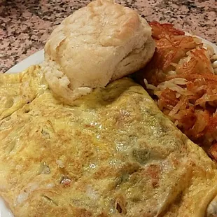 Omelette, hashbrowns and biscuit.