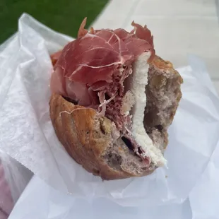 Inside of prosciutto and mozzarella sandwich