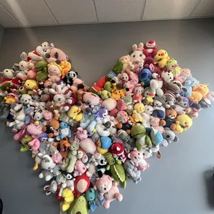 a heart made out of stuffed animals