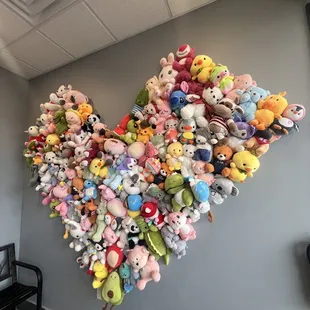 a heart made out of stuffed animals