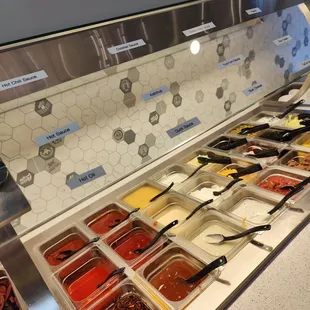 a variety of food items in a display case