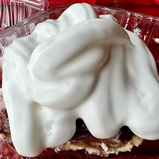 a piece of pie with whipped cream on top