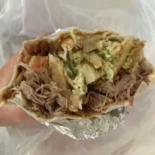 Carnitas California burrito (added refried beans)