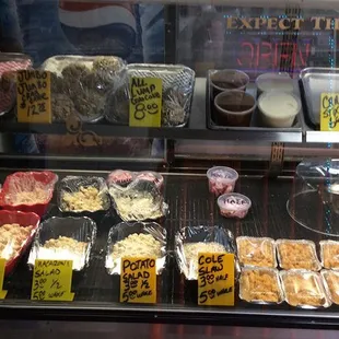 a display case of various foods