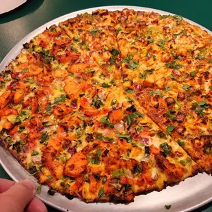 Thin crust, Large, Half and half pizza (chicken tandoori and shahi paneer)