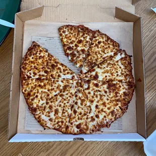 Medium extra cheese pizza. Cauliflower crust