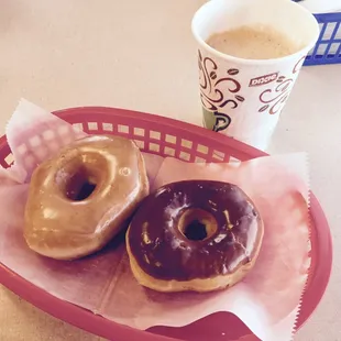 two donuts and a cup of coffee