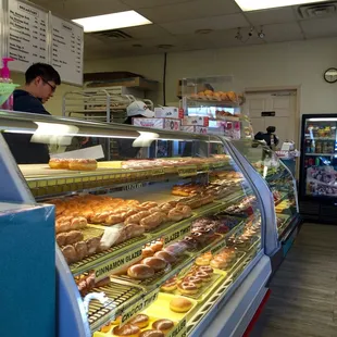 a bakery with a variety of donuts