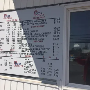 a menu on the outside of a restaurant