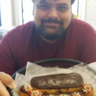 This is the way to have a birthday!  Chocolate long john with cream filling &amp; sprinkles chocolate iced cream filled donut holes.