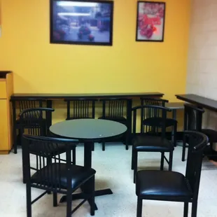 a table and chairs in a restaurant