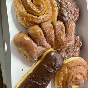 Selection of 6 BIG Donuts-Apple fritter, bear claw and a delicious crème filled chocolate covered one.