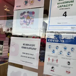 a store window with a sign in the window