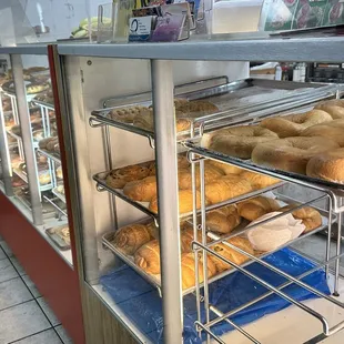 a display case filled with baked goods