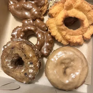 a variety of doughnuts in a box