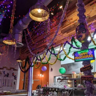 the inside of a restaurant decorated for mardi gras