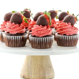Chocolate cupcakes with Chocolate covered Strawberries.