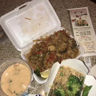 Apparently this is "Shrimp red curry" "Pad Thai" & "Thai fried rice."