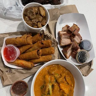 Bbq pork, lechon kawali, kare kare, beef lumpia and adobo