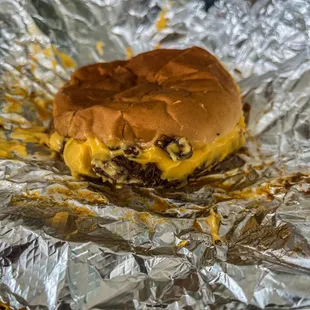 ows a cheeseburger wrapped in foil