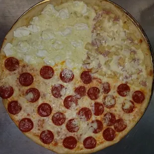 a pepperoni and onion pizza