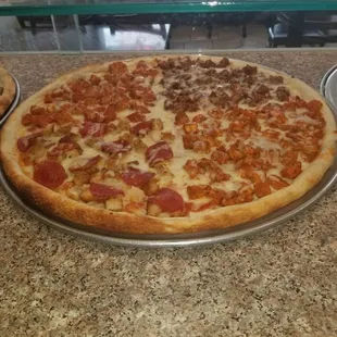 a pepperoni and sausage pizza