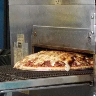 As the meatlovers comes through the cooker! Amazing!!