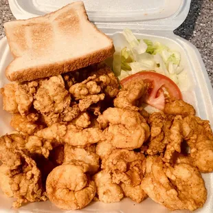 Fried oysters, shrimp, and tater tots.