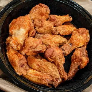 a bowl of chicken wings