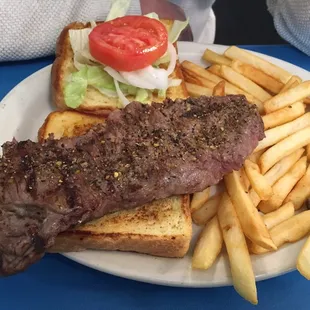 Steak sandwich and fries.