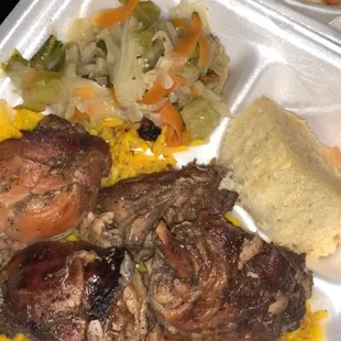 jerk chicken, yellow rice, cornbread, Steam Vegetables, and banana pudding