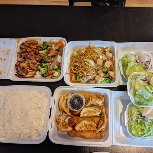 Family meal: chicken teriyaki + broccoli beef + tofu teriyaki with salad, rice, eggrolls and gyoza