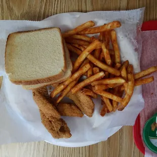a plate of fries and a sandwich