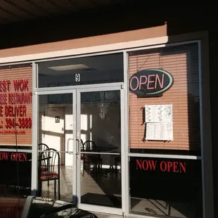 open sign in window of restaurant