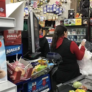 a woman at the cash register