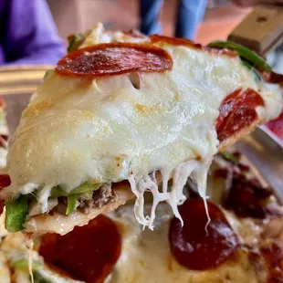 WOW.....so much yummy gooey mozzarella cheese !