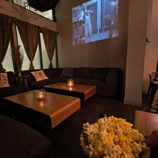 Chill at the lounge and watch a silent movie with free popcorn