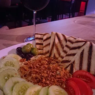SPOILED DAD or 'baba ganoush' platter..... Smokey eggplant spread with fresh tomatoes, cucumbers, olives and warm naan... Freshly made..