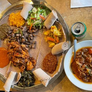 Vegetarian Combo and dish of delicious lamb. This plus the kitfo and 4 of us were stuffed!